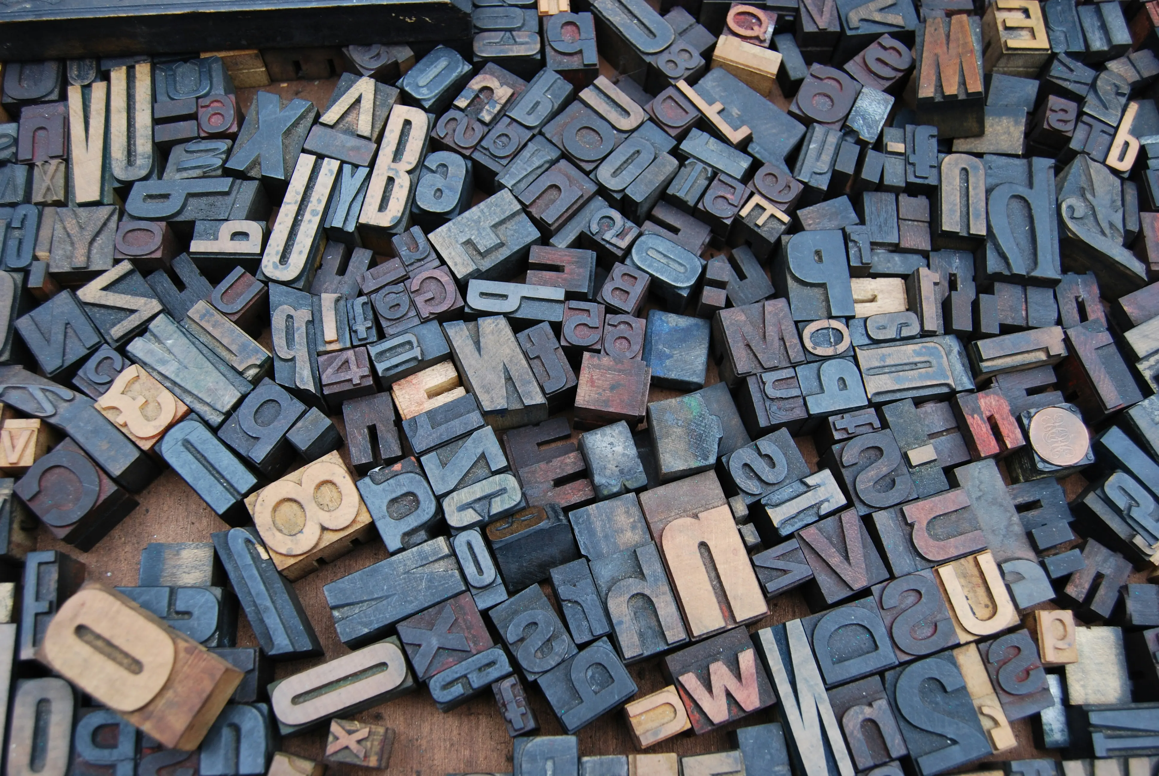 typography letters and wooden stamp
